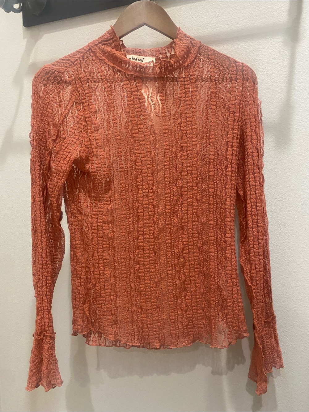 Three Bird Nest Coral Textured Ruffle Mock Neck Long Sleeve Top